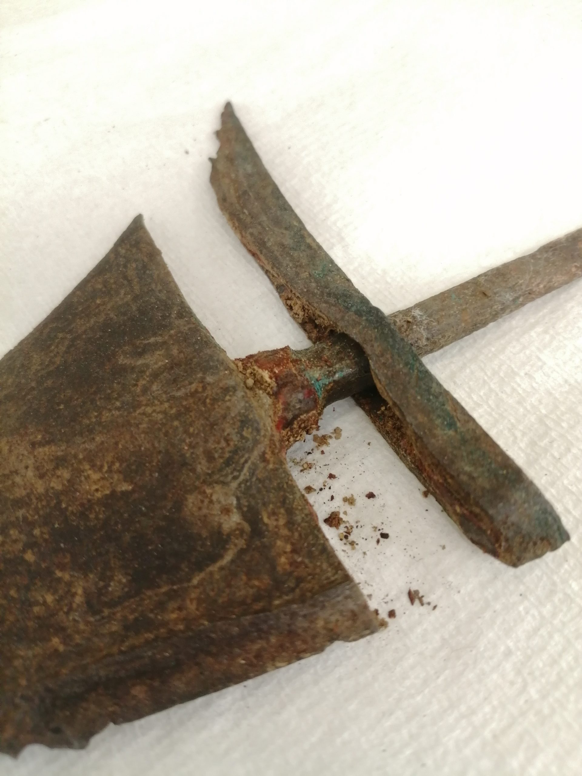 The tang and blade of an Indonesian Keris, once disassembled, showing deterioration of natural caulking.