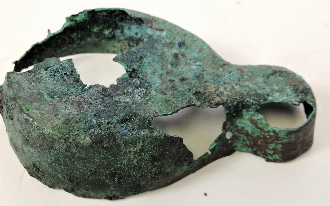 Infills and treatment of an archaeological copper alloy lamp